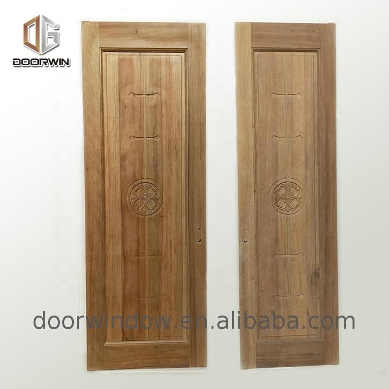Wooden doors for arc interiors wood grain entrance door solid wood with patterns casement door - Doorwin Group Windows & Doors