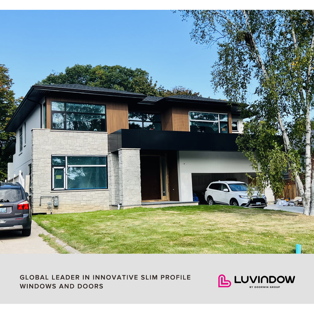 Perfect Style Blending of Curtain Wall  and Pivot Door  a Residential in Canada