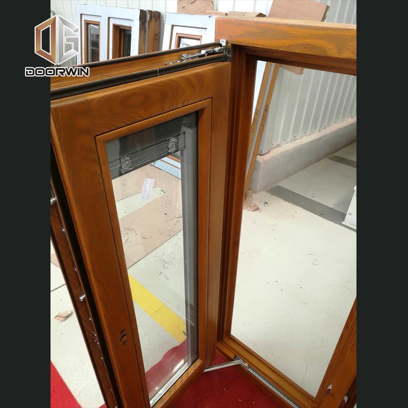 alu-clad oak wood French push out casement window - Doorwin Group Windows & Doors