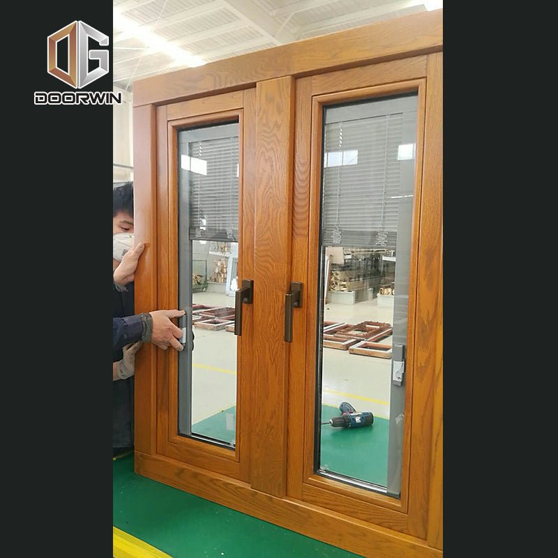 alu-clad oak wood French push out casement window - Doorwin Group Windows & Doors