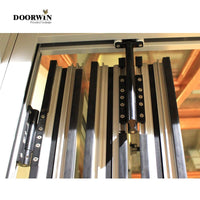 Aluminum patio / balcony double glass exterior accordion folding door Folding glass balcony aluminium bifold doors - Doorwin Group Windows & Doors