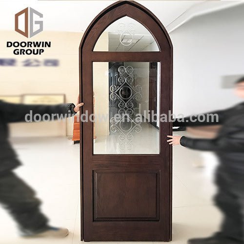 American New York popular solid oak wood villa housed arched top oval glass entry door by Doorwin - Doorwin Group Windows & Doors
