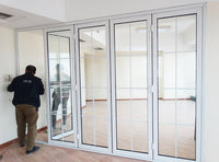 bi-folding door with colonial bars master - Doorwin Group Windows & Doors