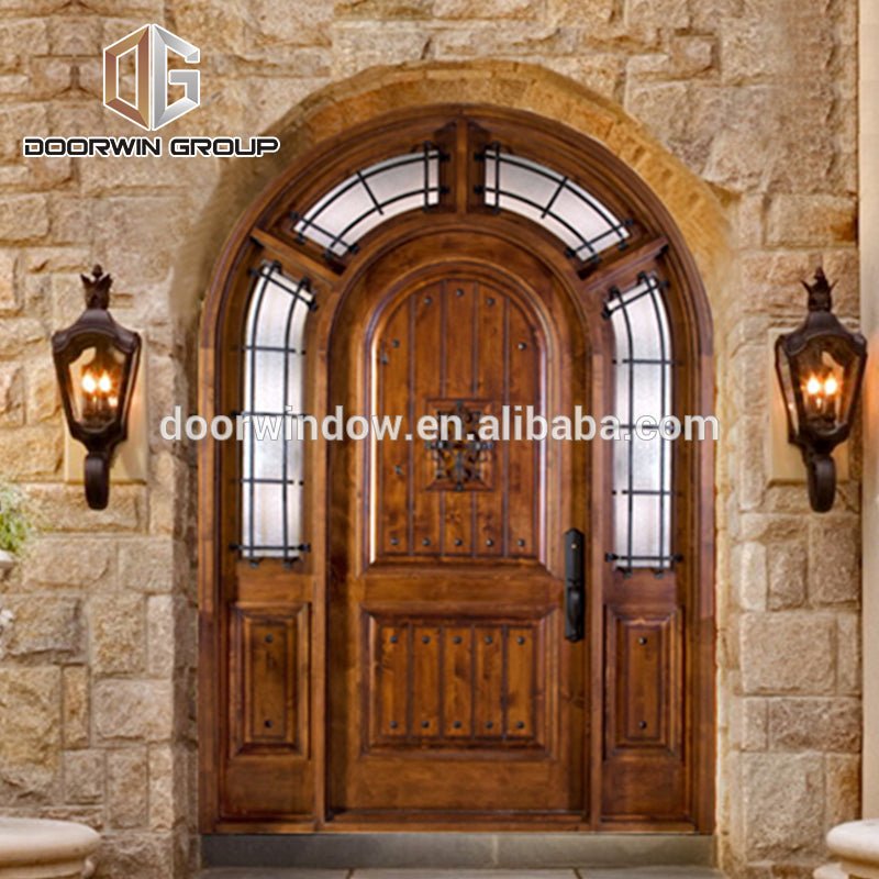 Church gate style design exterior wood front doors with top carving glass entry door with side lite rustic door by Doorwin - Doorwin Group Windows & Doors