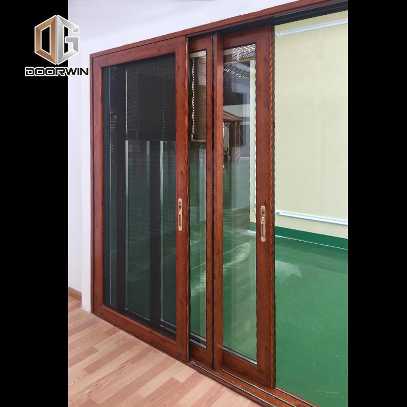 DOORWIN 2021wood grain three rails thermal break aluminum sliding door with screen door - Doorwin Group Windows & Doors