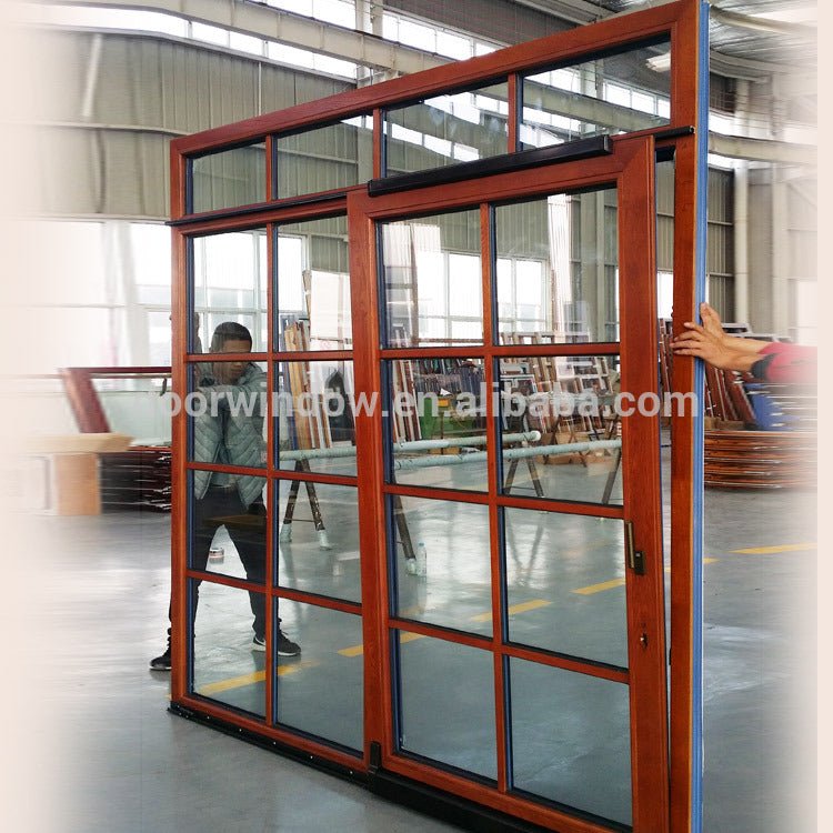 Factory direct price external wooden sliding doors exterior door with transom window entry - Doorwin Group Windows & Doors