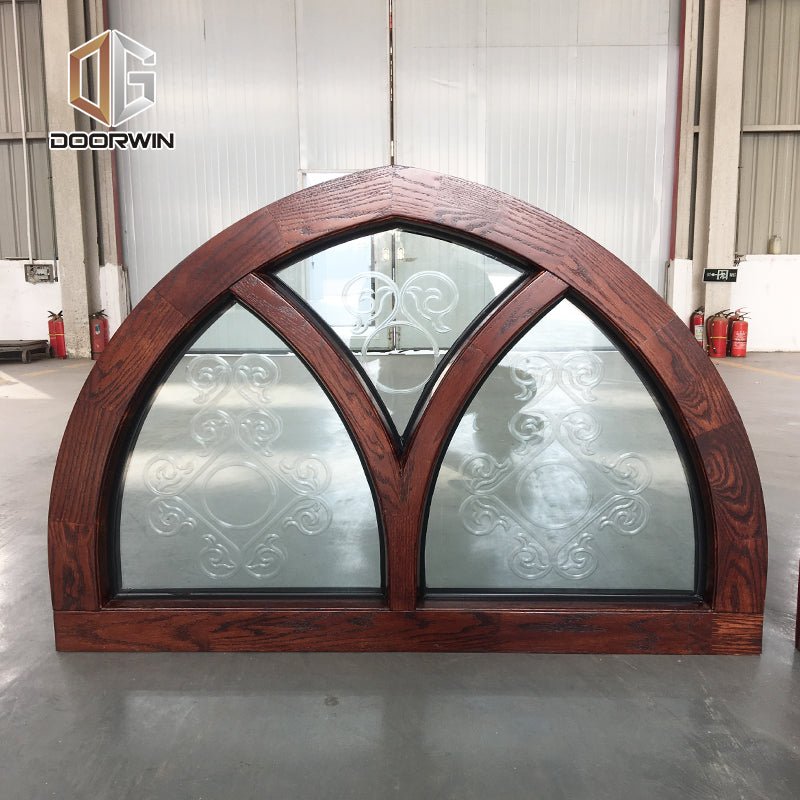 Fantastic arched oak wood window frame fixed transom and bottom rectangle window with carved glass - Doorwin Group Windows & Doors