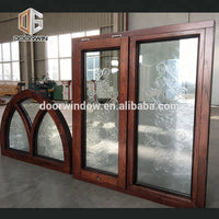 Fantastic arched oak wood window frame with carved glass for houseby Doorwin - Doorwin Group Windows & Doors