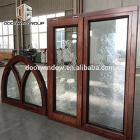 Fantastic arched oak wood window frame with carved glass for houseby Doorwin - Doorwin Group Windows & Doors
