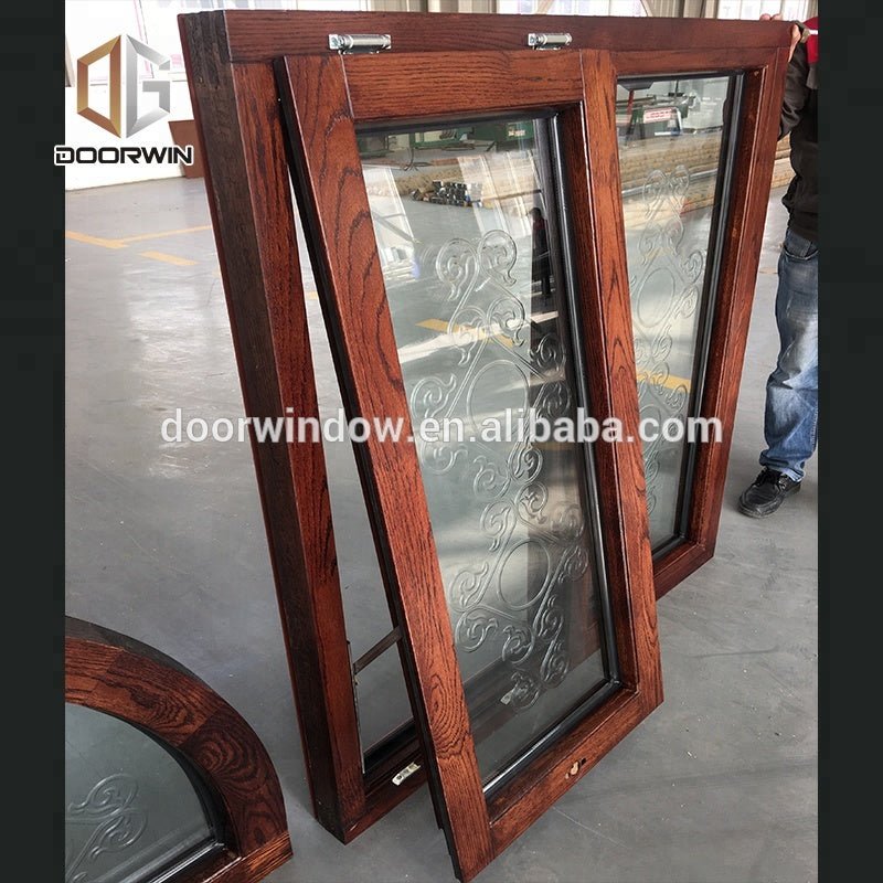 Fantastic arched oak wood window frame with carved glass for houseby Doorwin - Doorwin Group Windows & Doors