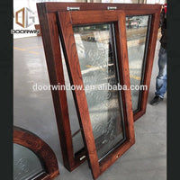 Fantastic arched oak wood window frame with carved glass for houseby Doorwin - Doorwin Group Windows & Doors