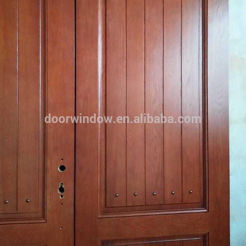 Finished product house front main double door design made of red oak wood flat solid wood doors by Doorwin - Doorwin Group Windows & Doors