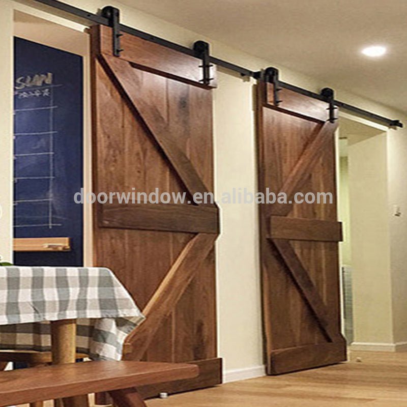 Hanging sliding barn door with wooden sliding door roller by Doorwin - Doorwin Group Windows & Doors