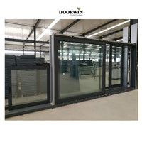 Huge aluminium doors windows Aluminum alloy double tempered glass three panels sliding stacking door - Doorwin Group Windows & Doors