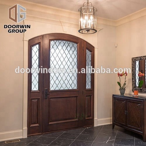 Kerala house main door design Unique house front main double door designs grey color oak grain door with hardware by Doorwin - Doorwin Group Windows & Doors