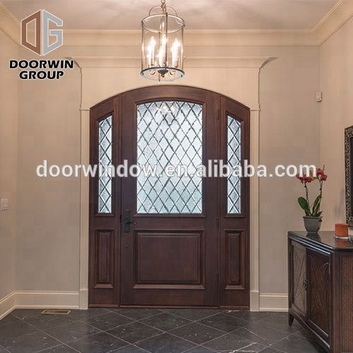 Kerala house main door design Unique house front main double door designs grey color oak grain door with hardware by Doorwin - Doorwin Group Windows & Doors