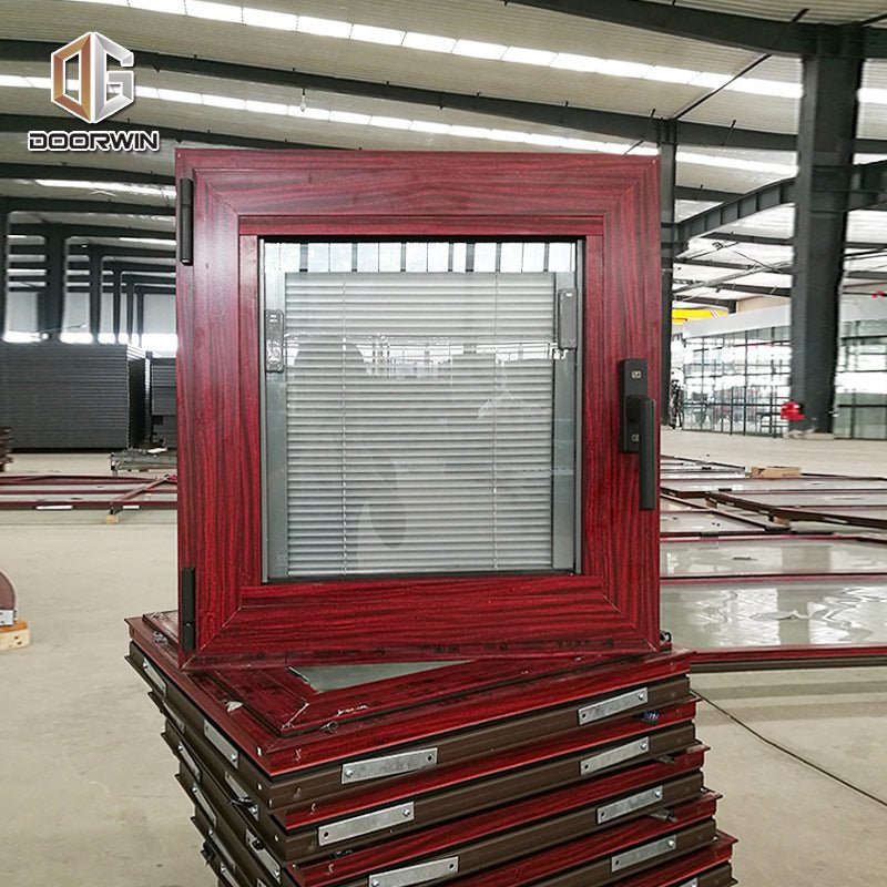 Las Vegas swing window with timber reveal with wood effect aluminium powder coating paint - Doorwin Group Windows & Doors