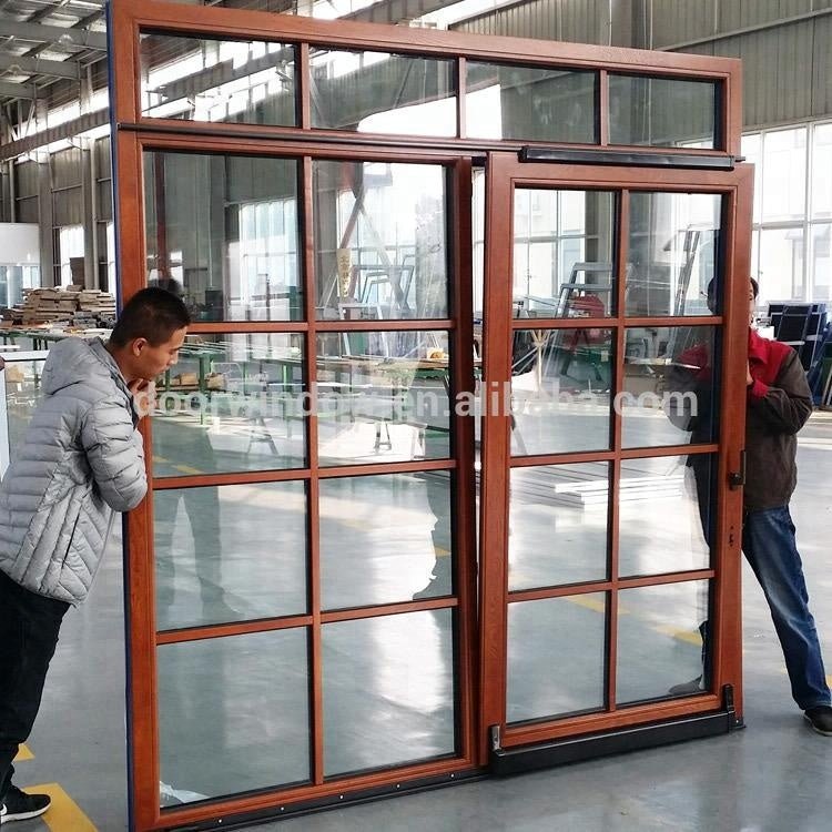 modern main gate designs tilt sliding doors by Doorwin - Doorwin Group Windows & Doors