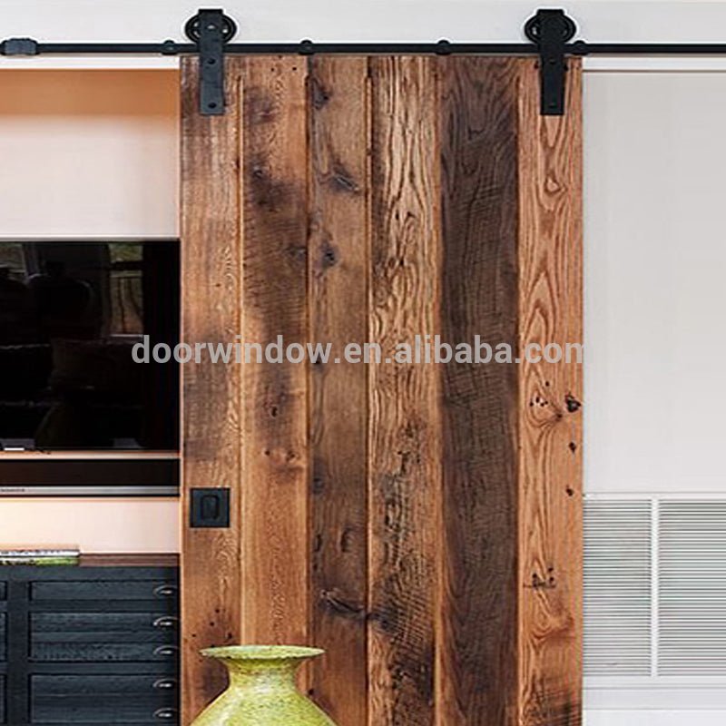 Movable plank panel wooden doors design catalogue surface stained sliding barn door for partition by Doorwin - Doorwin Group Windows & Doors