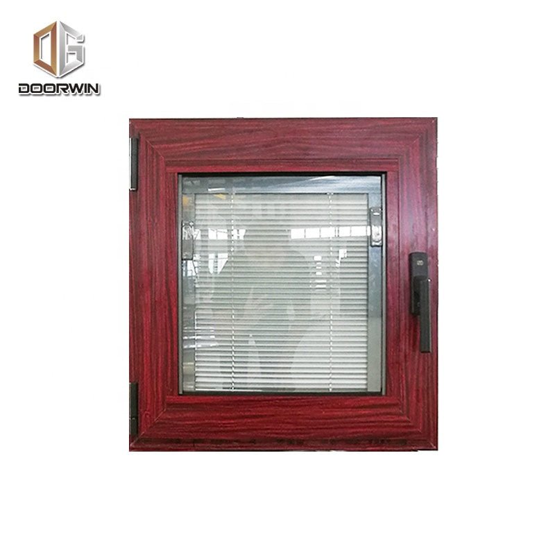 New York wood grain tempered glass aluminium tilt and turn window with built in shuttersby Doorwin - Doorwin Group Windows & Doors