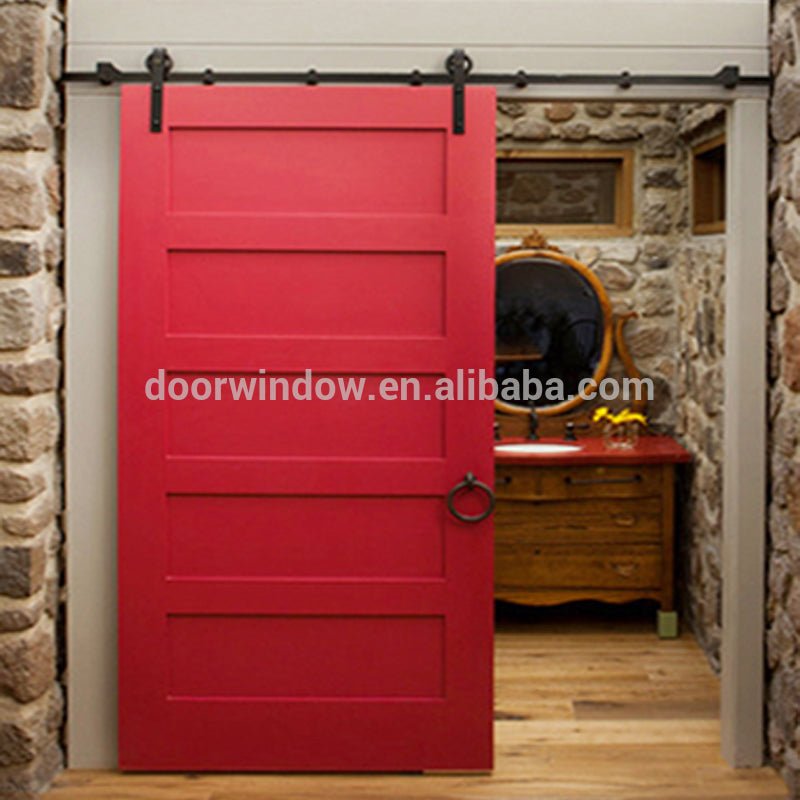 Nice looking American sliding barn door X type made of pine wood by Doorwin - Doorwin Group Windows & Doors