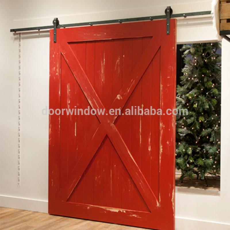 Nice looking American sliding barn door X type made of pine wood by Doorwin - Doorwin Group Windows & Doors
