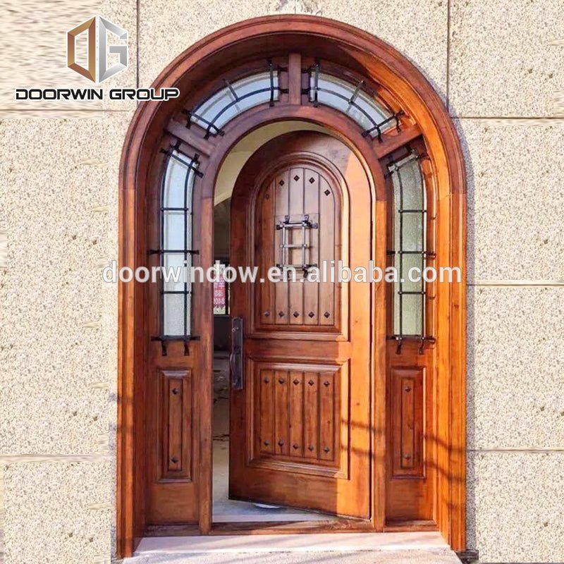 North America popular front french doors round top design with decorative wrought iron clavos by Doorwin - Doorwin Group Windows & Doors