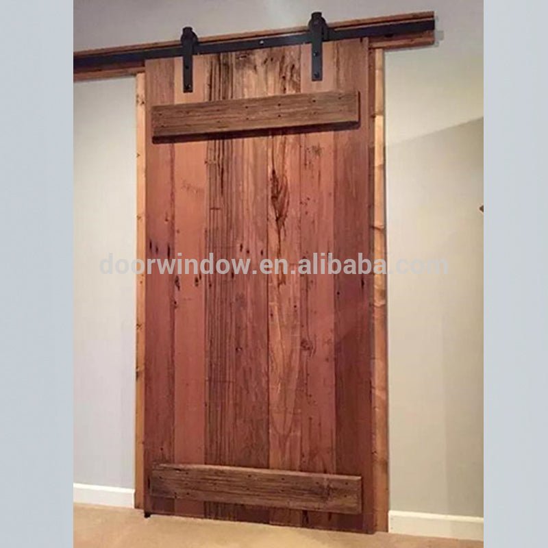 Old knotty alder pine larch wooden door slats designs by-passing sliding barn door with heavy track by Doorwin - Doorwin Group Windows & Doors