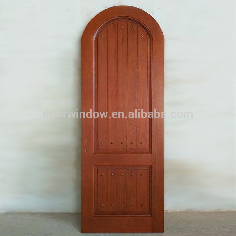 Round top design interior solid red oak wood door with copper nail by Doorwin - Doorwin Group Windows & Doors