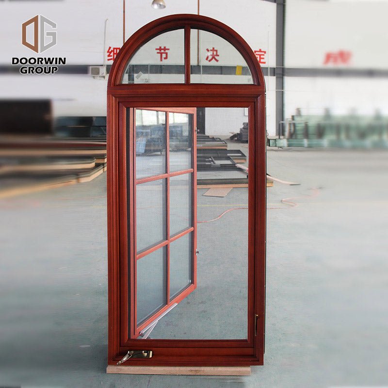 Round top fixed window and bottom crank open window with decorative glazing bars - Doorwin Group Windows & Doors