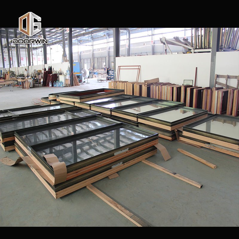 Round top fixed window and bottom crank open window with decorative glazing bars - Doorwin Group Windows & Doors