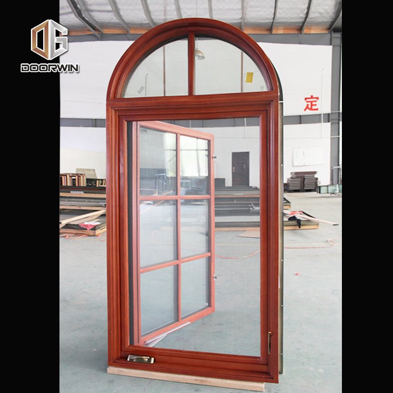 Round top fixed window and bottom crank open window with decorative glazing bars - Doorwin Group Windows & Doors