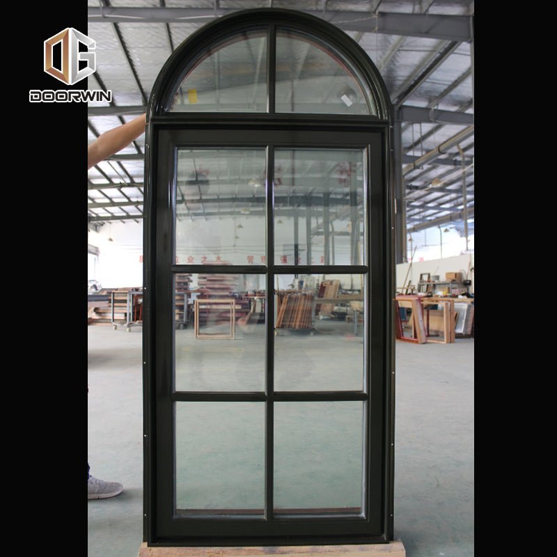 Round top fixed window and bottom crank open window with decorative glazing bars - Doorwin Group Windows & Doors