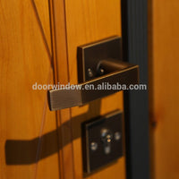 security doors homes exterior panel door design knotty alder wood door with copper tack decoration steel framed by Doorwin - Doorwin Group Windows & Doors