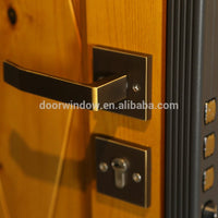 security doors homes exterior panel door design knotty alder wood door with copper tack decoration steel framed by Doorwin - Doorwin Group Windows & Doors