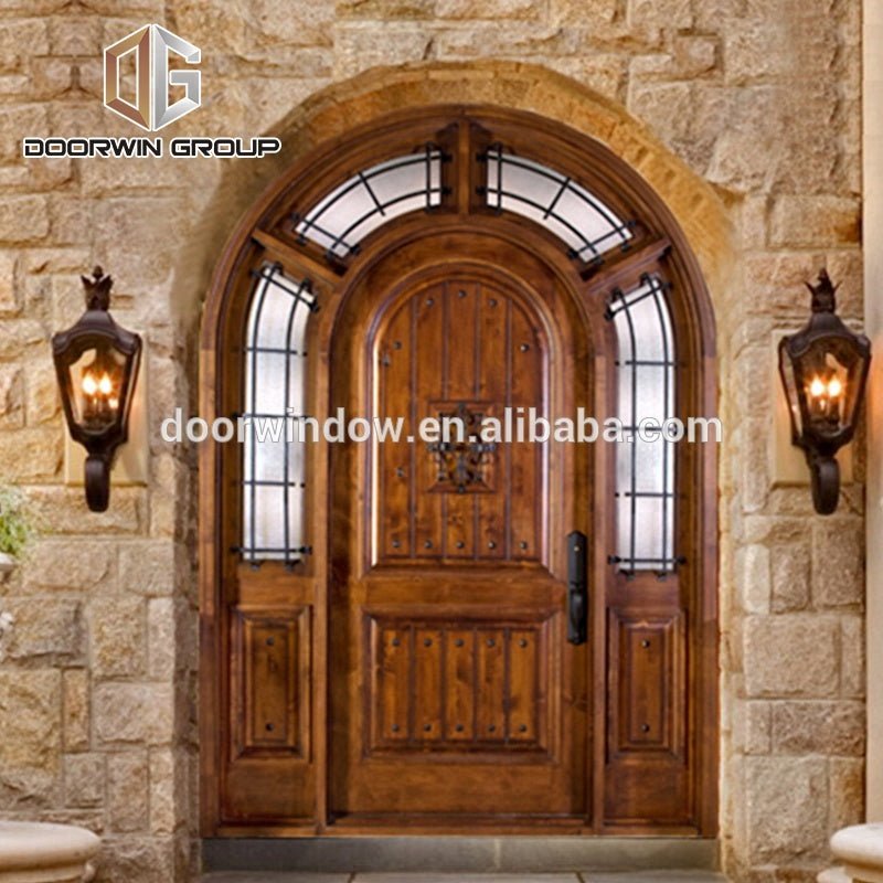 Solid pine wood top glass panels door main gate designs in wood with grilles by Doorwin - Doorwin Group Windows & Doors