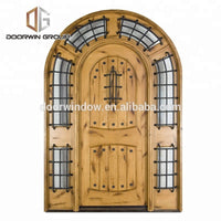 Solid pine wood top glass panels door main gate designs in wood with grilles by Doorwin - Doorwin Group Windows & Doors