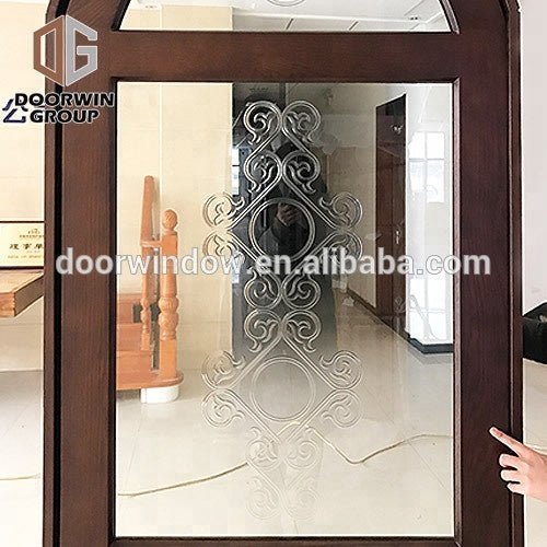 Solid wood front door with top glass and grilles design entry door for home by Doorwin - Doorwin Group Windows & Doors