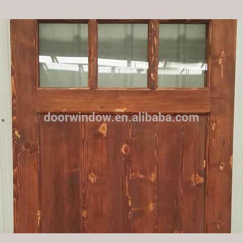 Surface stained oak wood main door designs barn door with fully tempered glass by Doorwin - Doorwin Group Windows & Doors