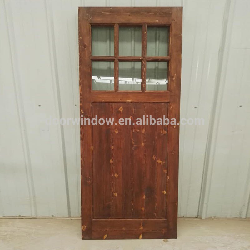 Surface stained oak wood main door designs barn door with fully tempered glass by Doorwin - Doorwin Group Windows & Doors