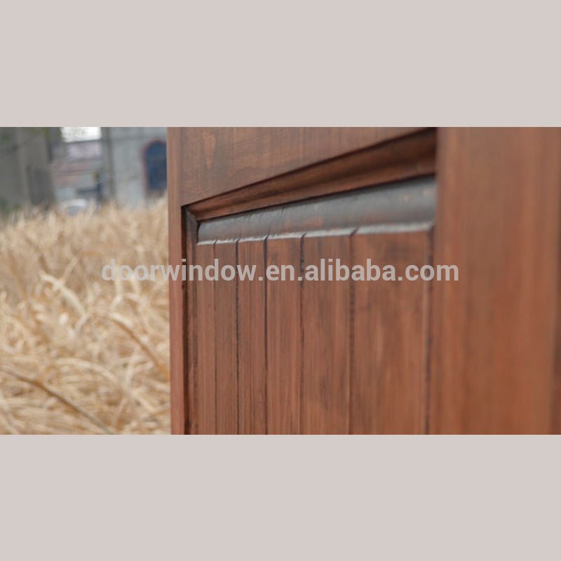 Surface stained oak wood main door designs barn door with fully tempered glass by Doorwin - Doorwin Group Windows & Doors