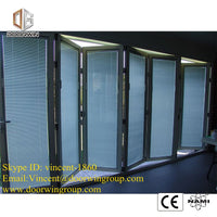 WHITE THERMAL BREAK ALUMINUM BI-FOLDING DOOR - Doorwin Group Windows & Doors