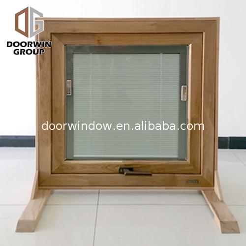 Wood clad aluminum awning window with new design - Doorwin Group Windows & Doors