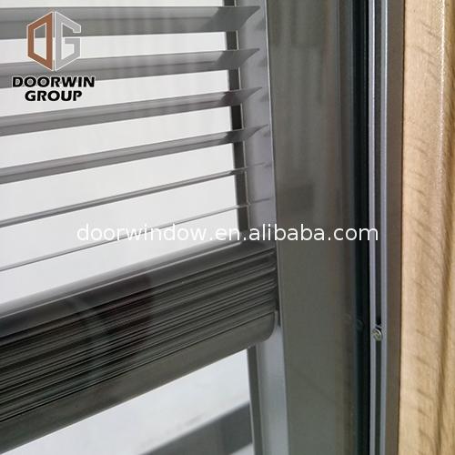 Wood louver panels windows with glass shutters window interior by Doorwin on Alibaba - Doorwin Group Windows & Doors