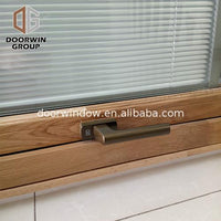 Wood louver panels windows with glass shutters window interior by Doorwin on Alibaba - Doorwin Group Windows & Doors